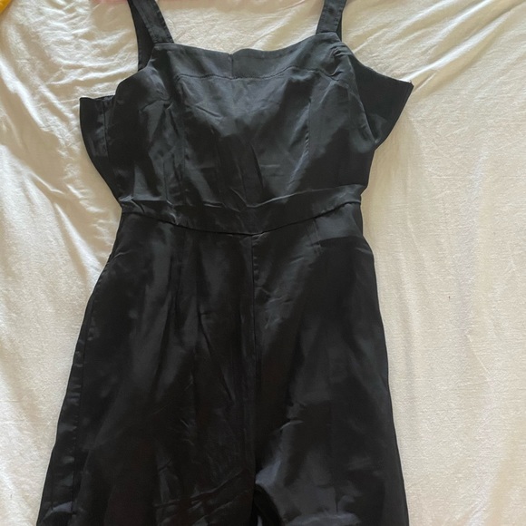 Black romper. Ties in  back. Size small. - Picture 2 of 4